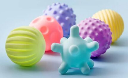 Colourful sensory toys in pastel colours, creating a relaxing, child-friendly atmosphere at the family-friendly hotel.