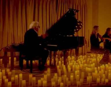 Elegant hotel lounge with live piano music and ambient candlelight. Experience relaxing evening entertainment.